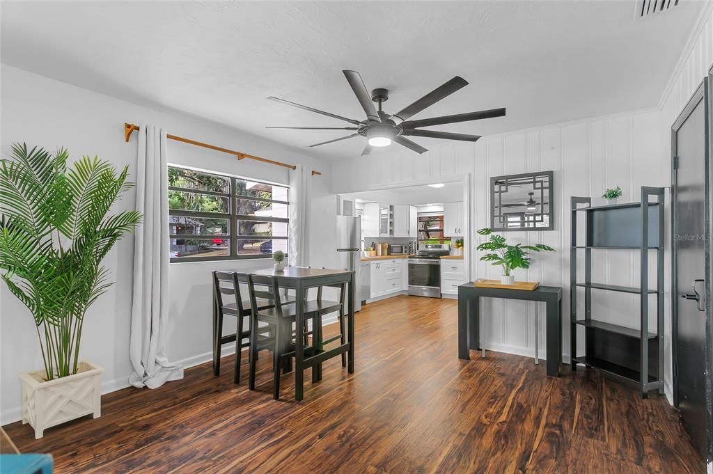 Looking towards the living, dining and kitchen area