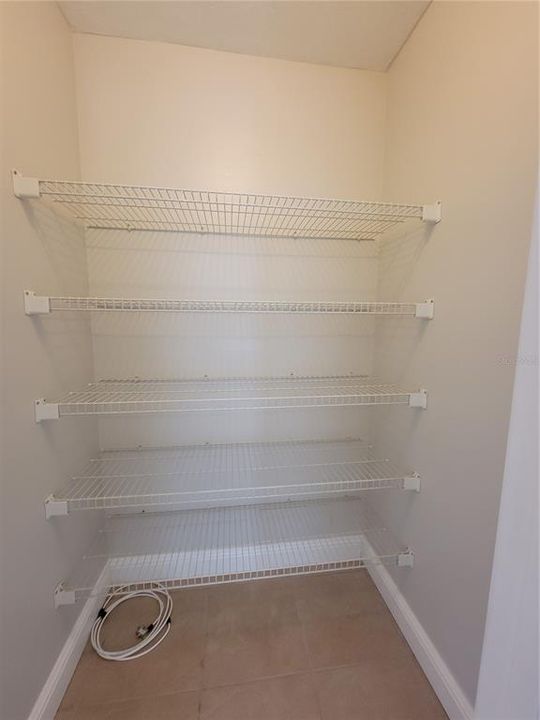 Storage closet off living room