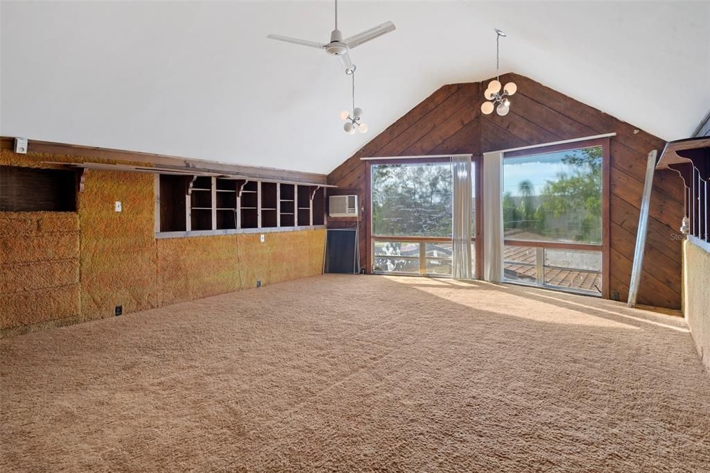 5th guest bedroom with built-ins and separate attic access with sub-floor