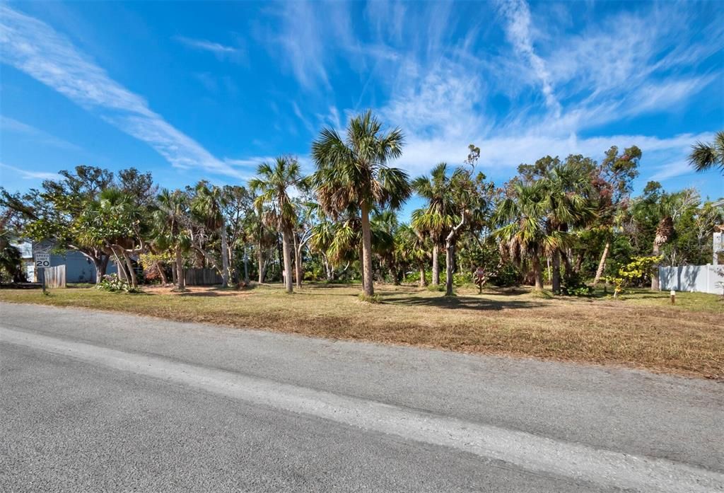 The front of the lot faces south and is on a publicly maintained paved road.