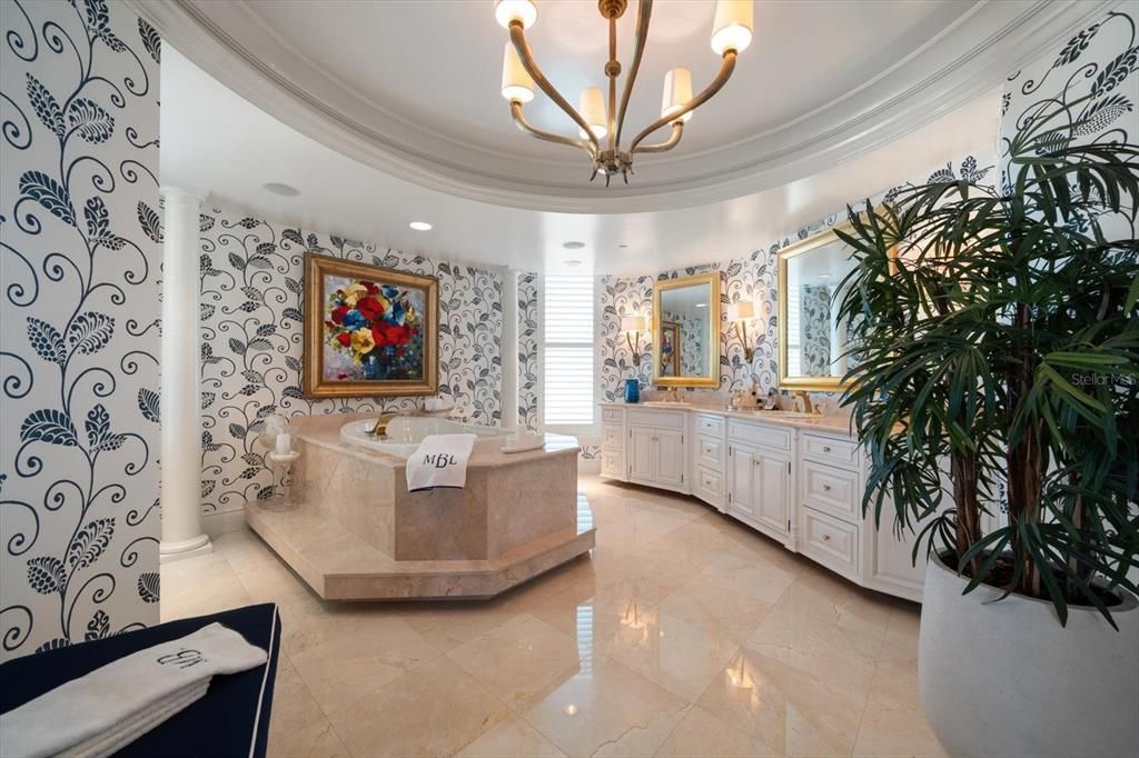 Impressive details are evident from the moment one enters this gorgeous primary bath area. Spaciousness and storage galore are prevalent throughout this lovely room.