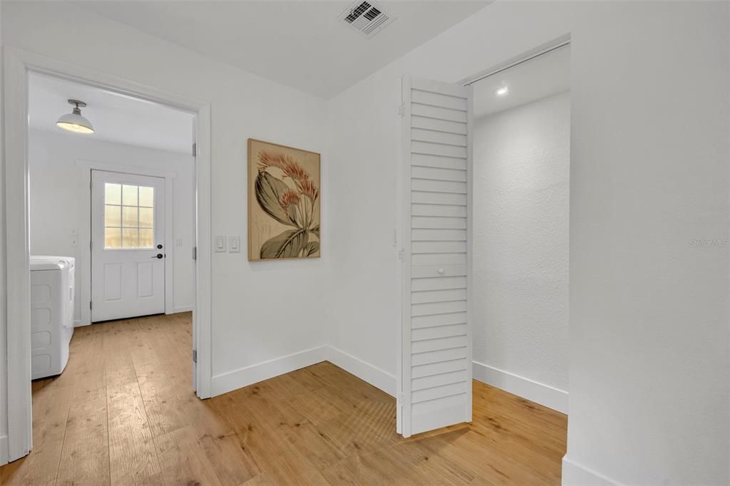 Having an indoor Laundry room right off the kitchen and right next to the garage will make doing laundry feel a little less of a chore.