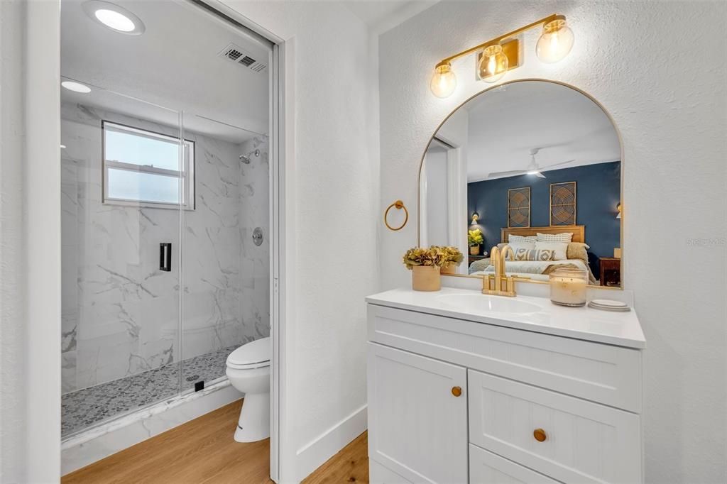 Gorgeous shower and tile make this bathroom stand out.