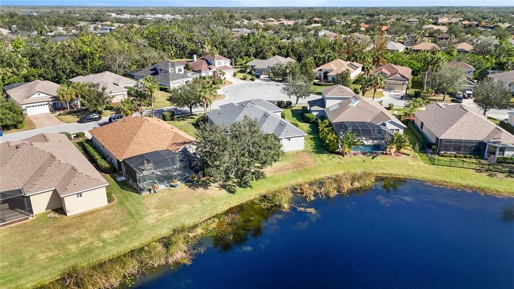 Southwest view of large serene lake directly behind home