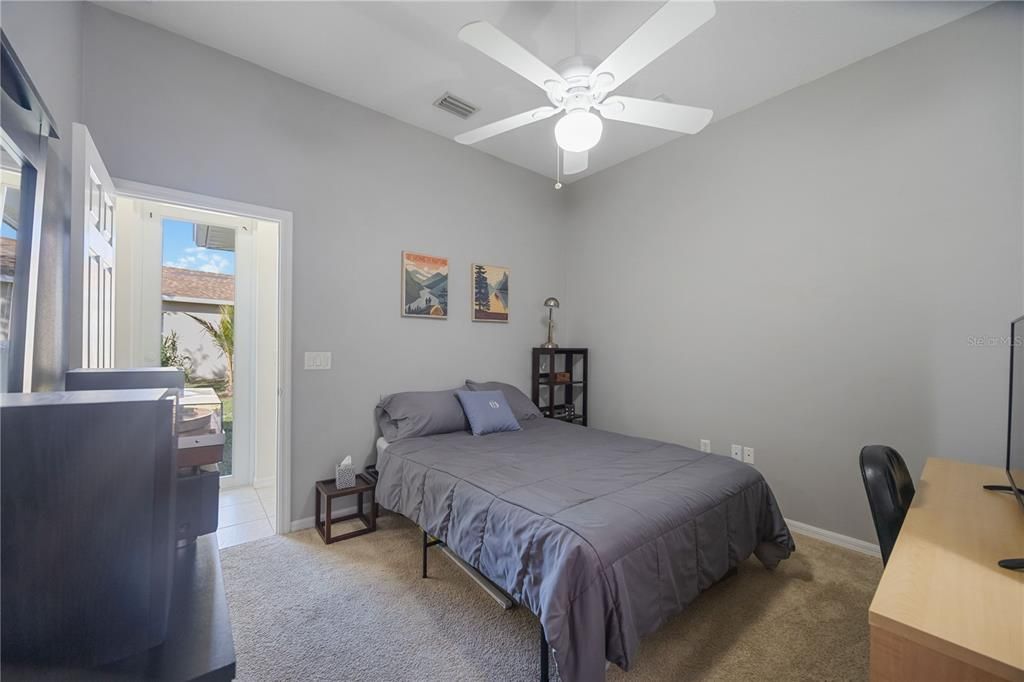 Fourth bedroom situated in the back of the home behind family room