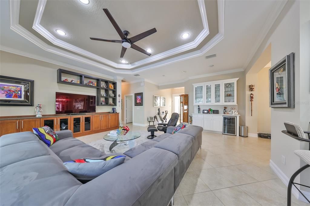 open atmosphere living area with built-in cabinets