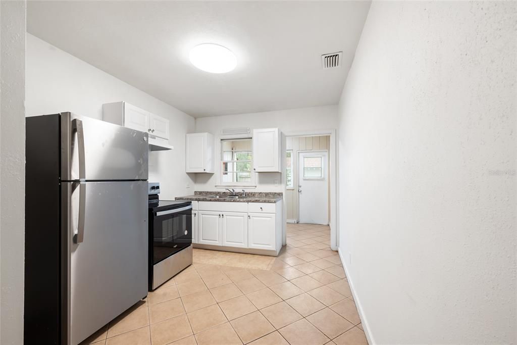 206 kitchen leading to utility room