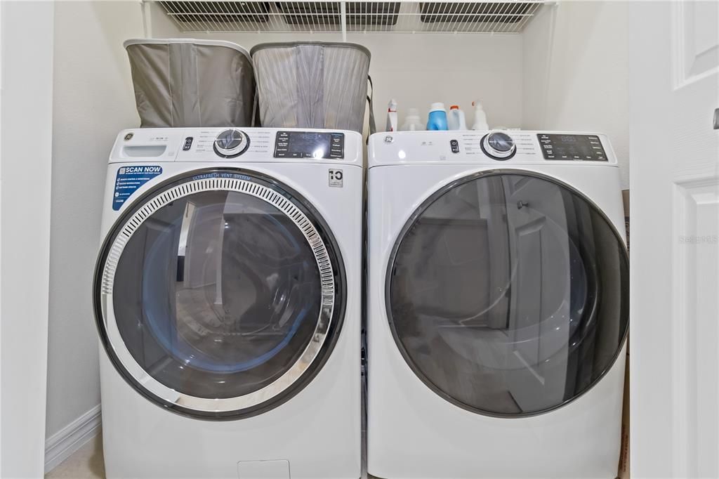 Laundry closet with new washer and dryer