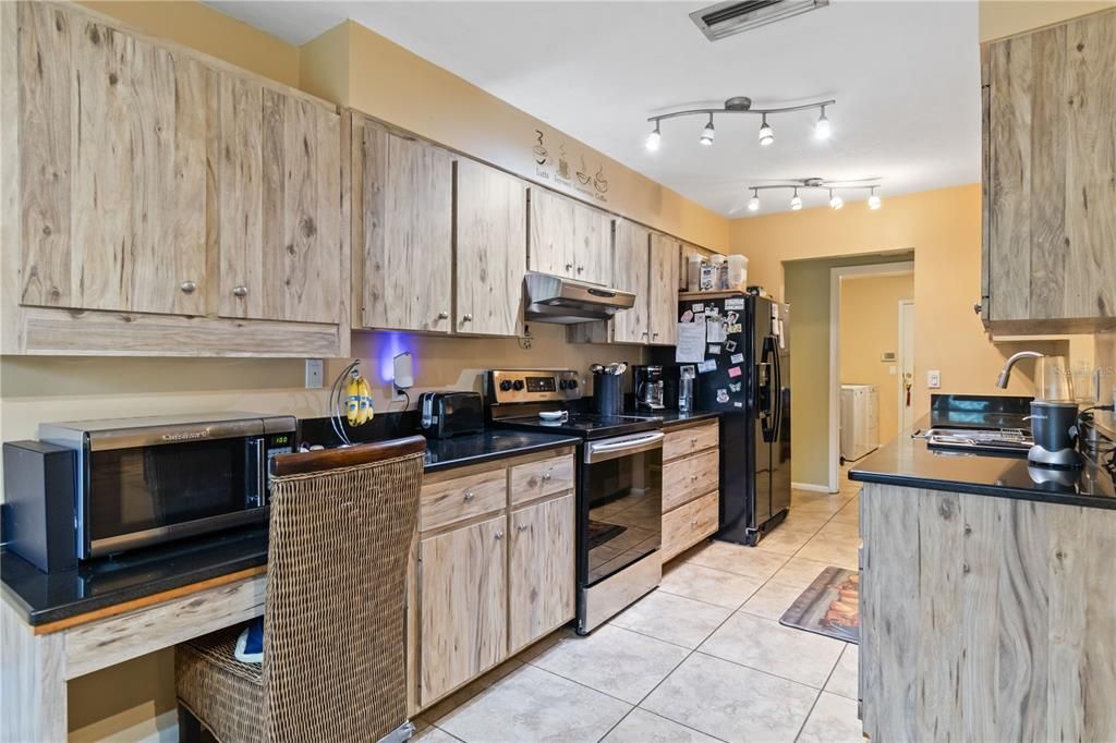 Ample cabinet space and granite counters