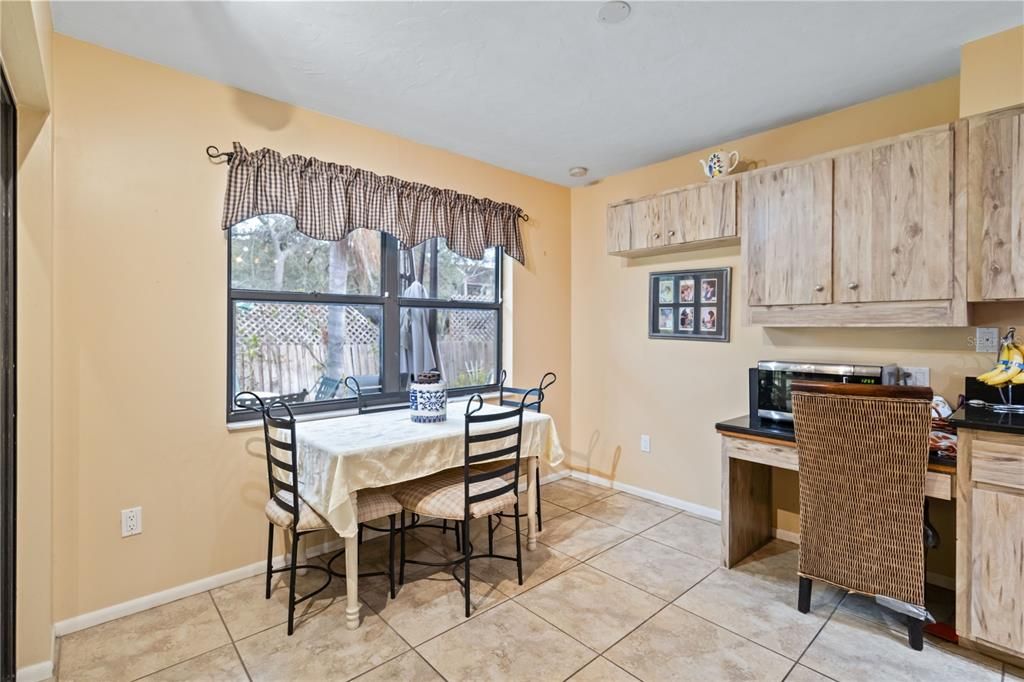 Kitchen has built in desk