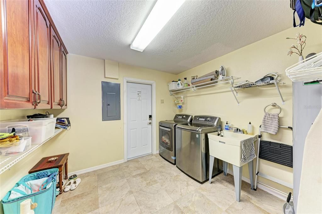 interior large utility room with washer and dryer