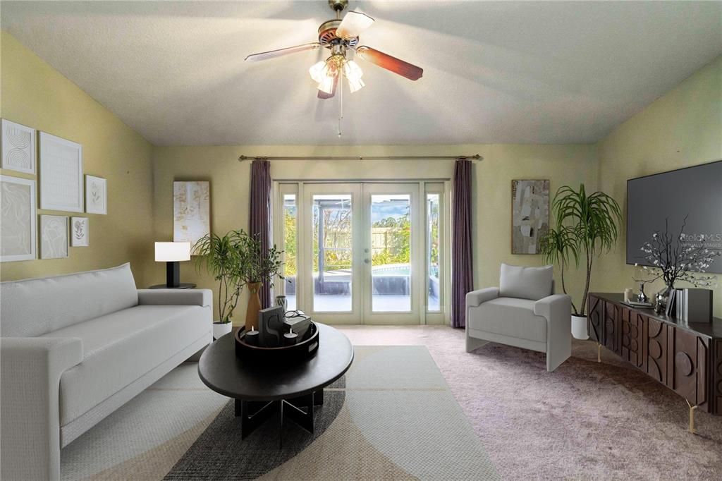 The living room overlooks the patio and pool area.