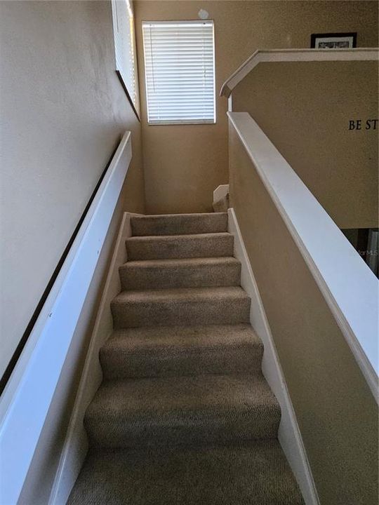 Staircase leading to the 2nd floor.