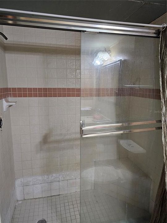 Primary bathroom shower. Unfinished remodel.