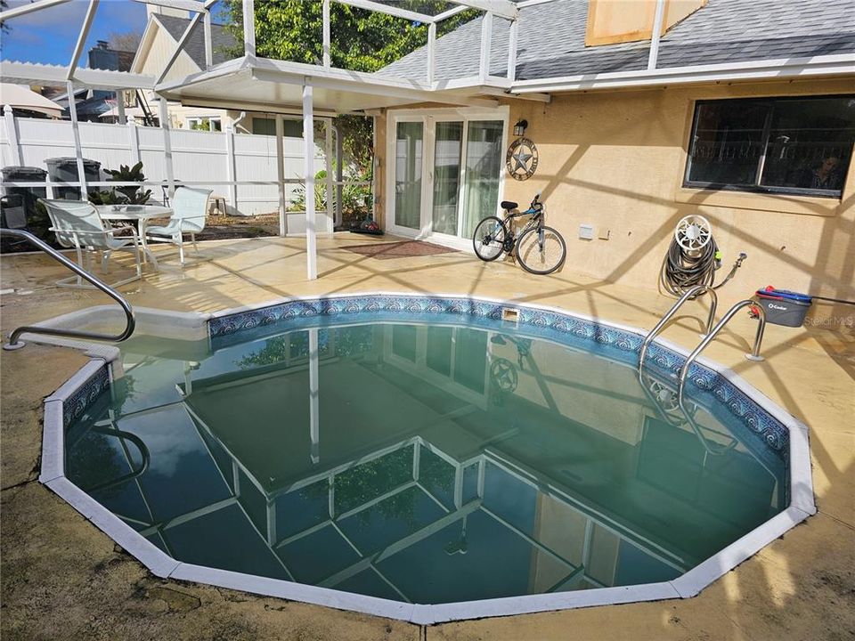 Screened enclosed pool/patio.