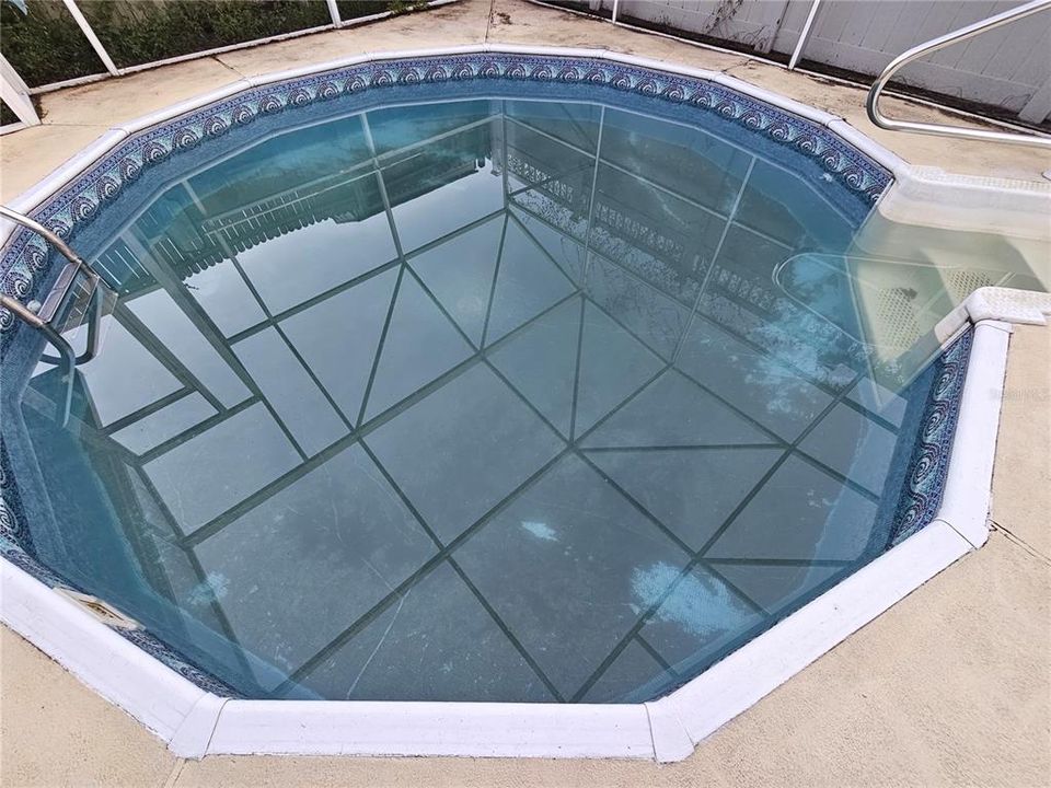 Screened enclosed pool/patio.