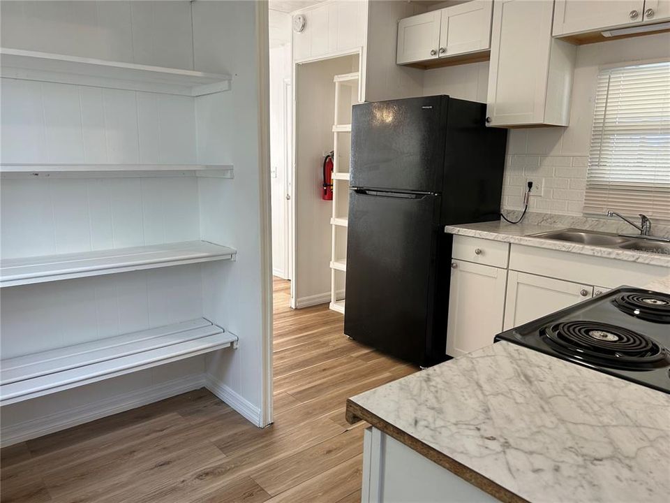 Kitchen with built in pantry