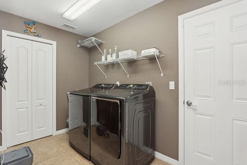 large utility room with storage area