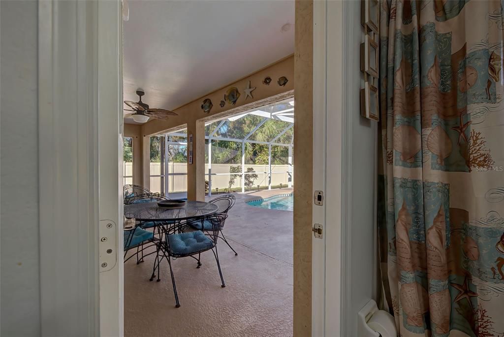 Doorway from guest bath to pool/lanai