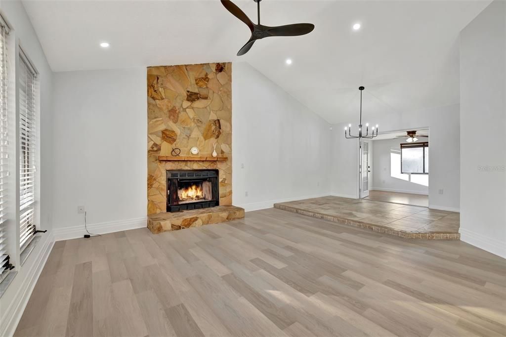 Open concept Living room / dining room with High ceilings