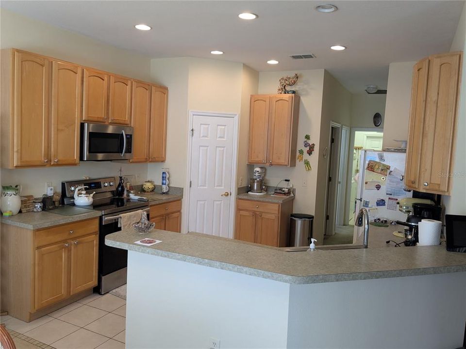 kitchen with corner walk in pantry