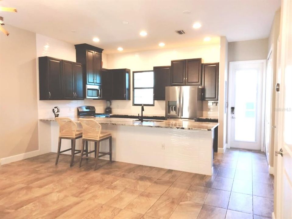 View of kitchen from living area