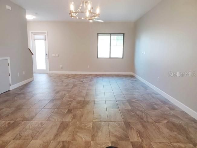 View of spacious living area from kitchen