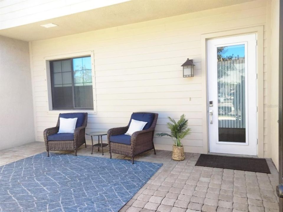 Front patio comes with outdoor furniture