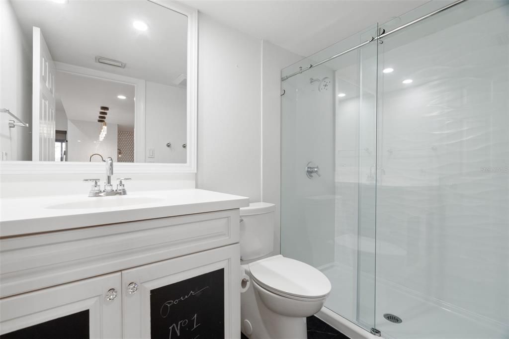 Main bathroom with walk-in shower.