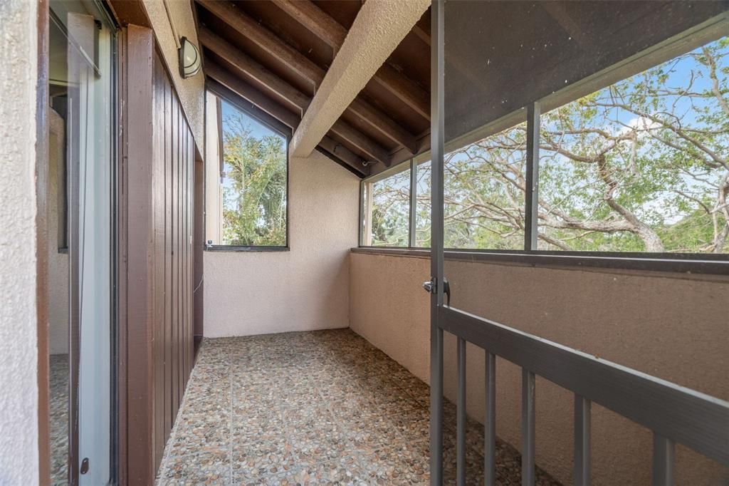 Covered entrance and screened in porch.