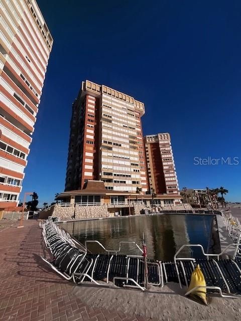 Pool and rear of Tower 2 (pool and rec center being restored after Hurricanes Helene and Milton)