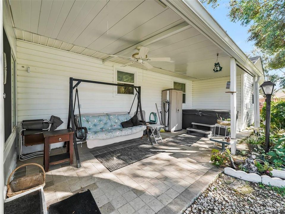 BACK COVERED PORCH WITH HOT TUB, PAVERS