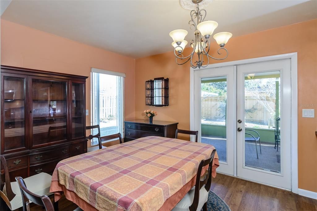 The current owners installed french doors leading to the large screened porch.