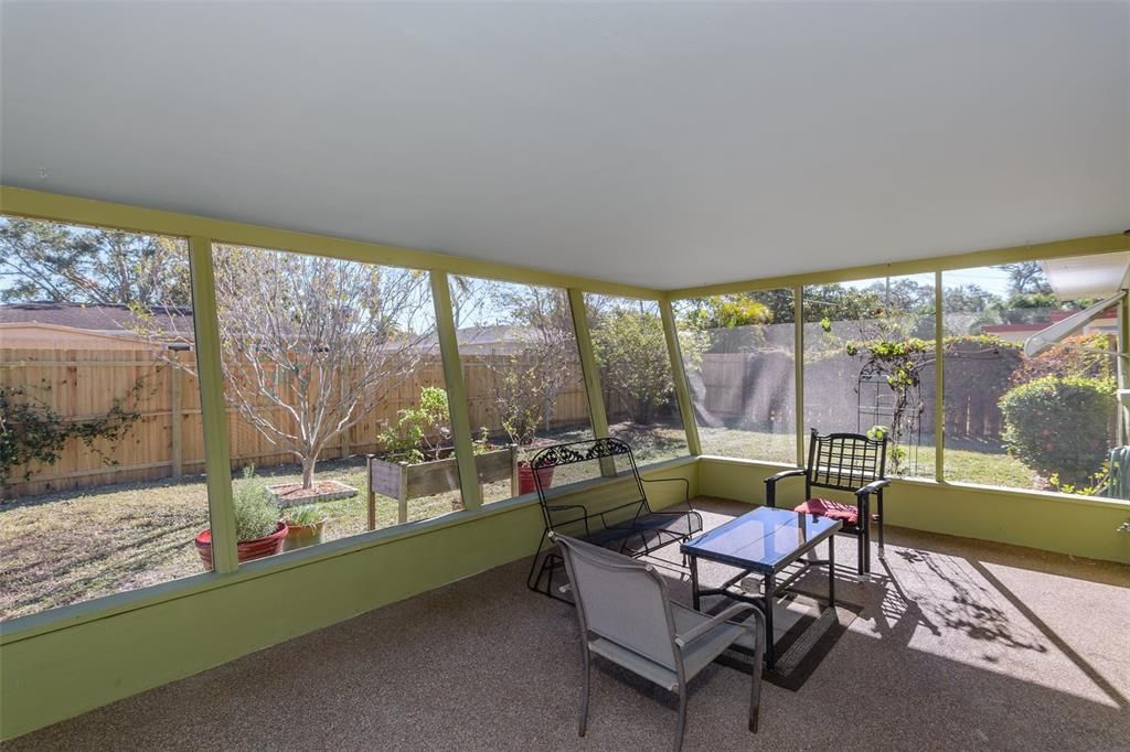 The screened patio is on the east side of the house for shade almost all day.