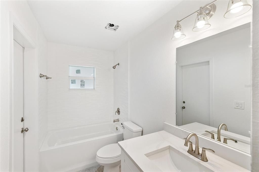 Guest Bathroom with access to Lanai