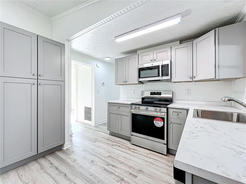 Kitchen with new stainless steel appliances