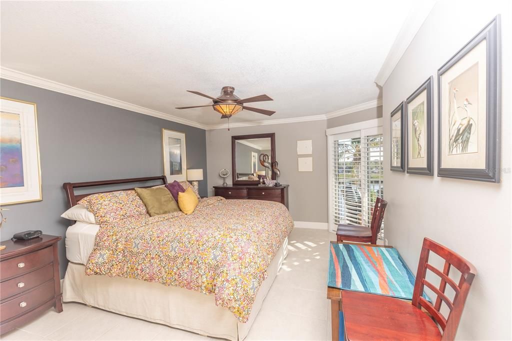 Master Bedroom With Sliding Doors To Water View!