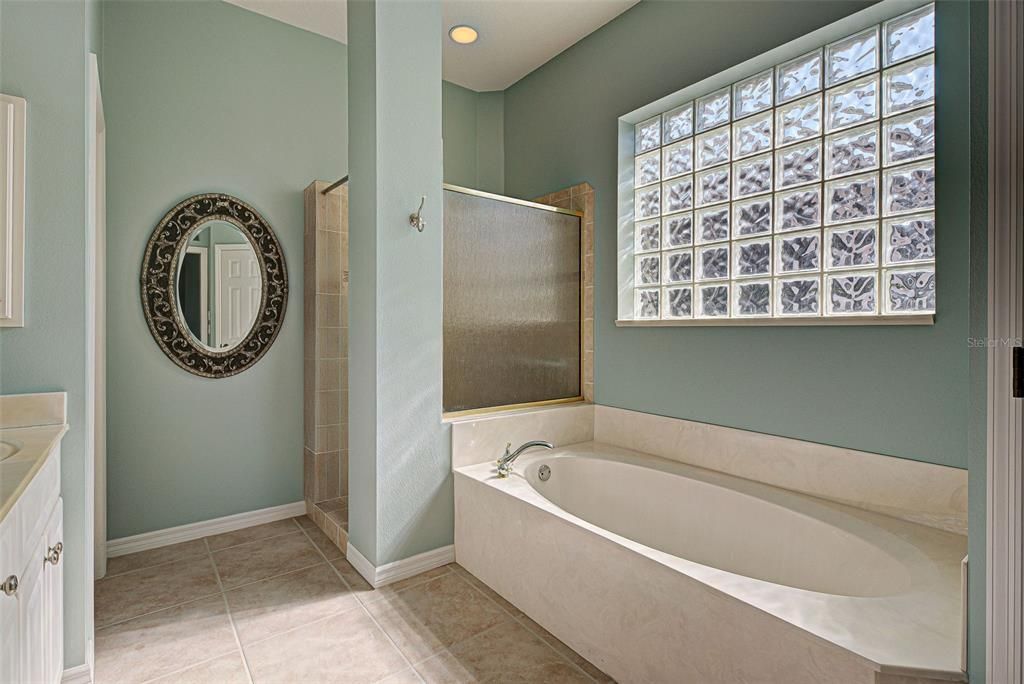 Unwind and let your cares drift away in the garden tub.