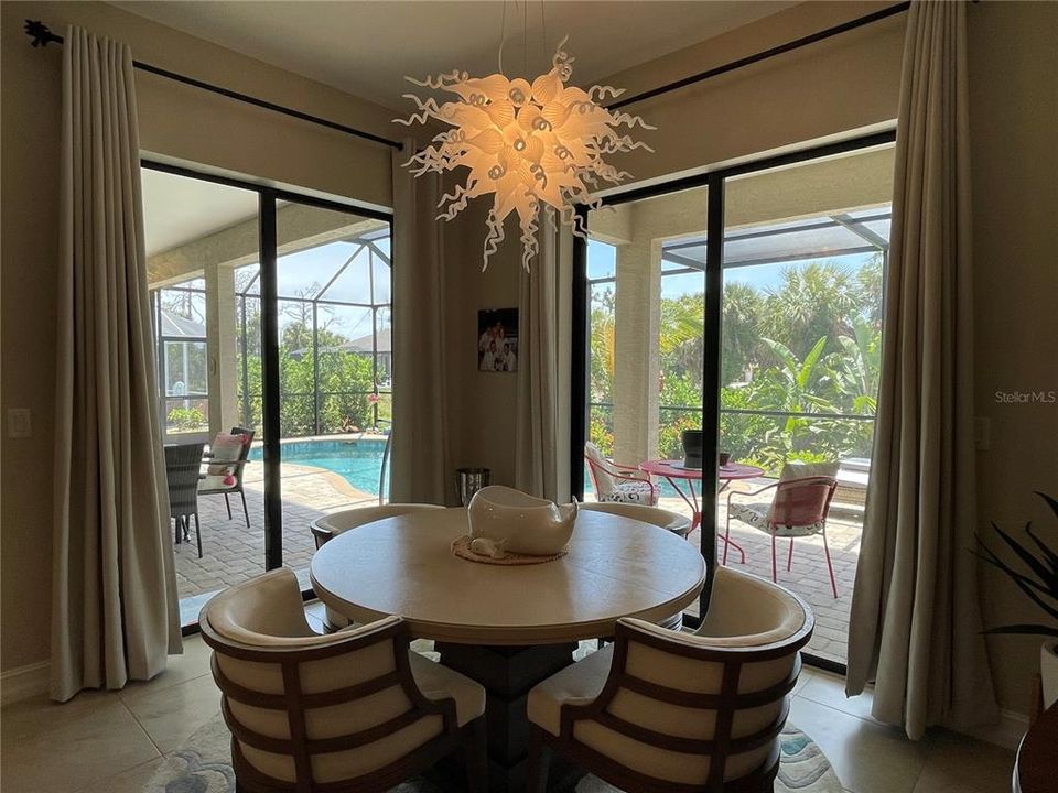 Dining Area with Dual Sliders to Lanai