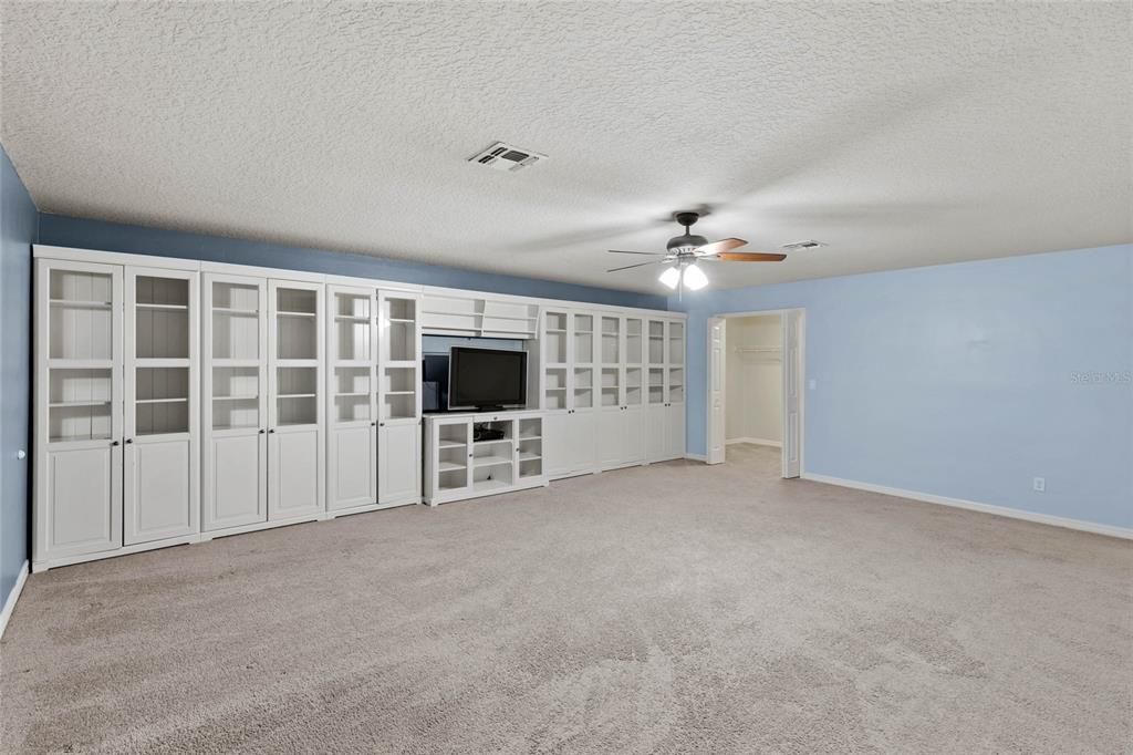 Build in cabinets and walk in closet in bonus room