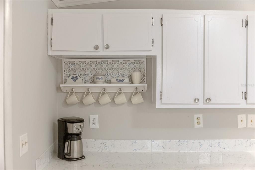 Resin Counters and White Cabinets