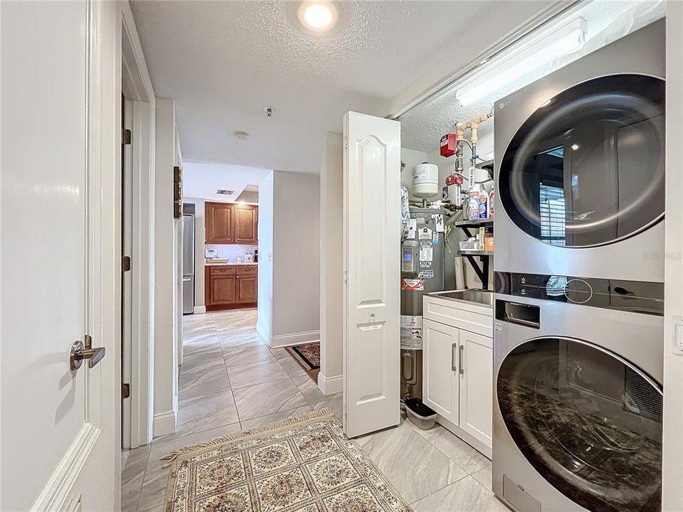 One car garage includes lots of storage, plus pull down stairs and access to large attic storage