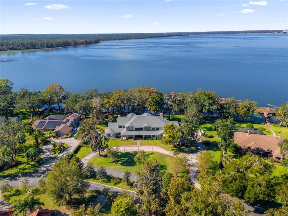 Front of house with Lake Dora in view