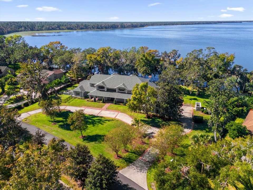 Front of house with Lake Dora in view