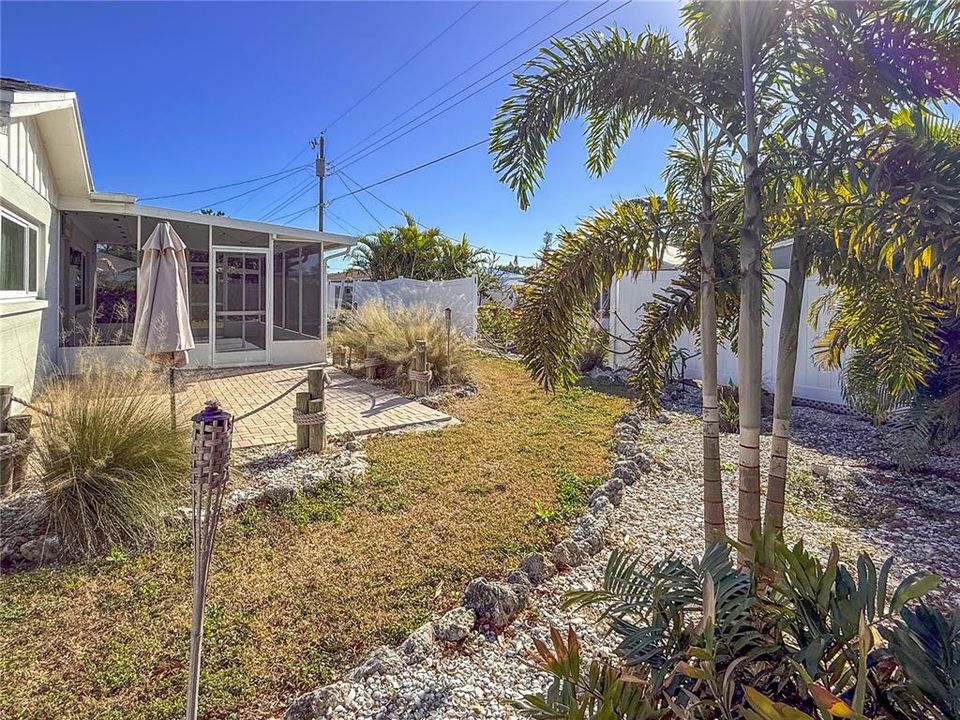 Backyard - completely fenced - white fence to be repaired by neighbors