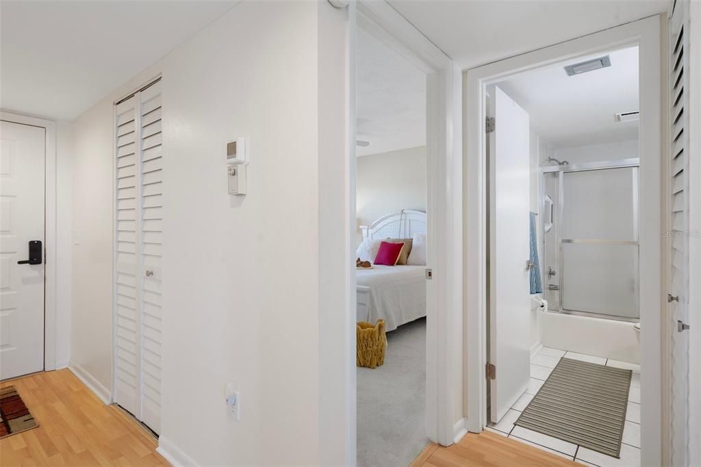 Foyer and hall to guest bath and guest bedroom