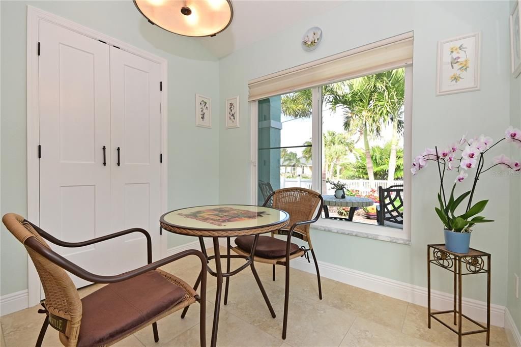 Kitchen Pantry has wood shelves and auto-on lighting.