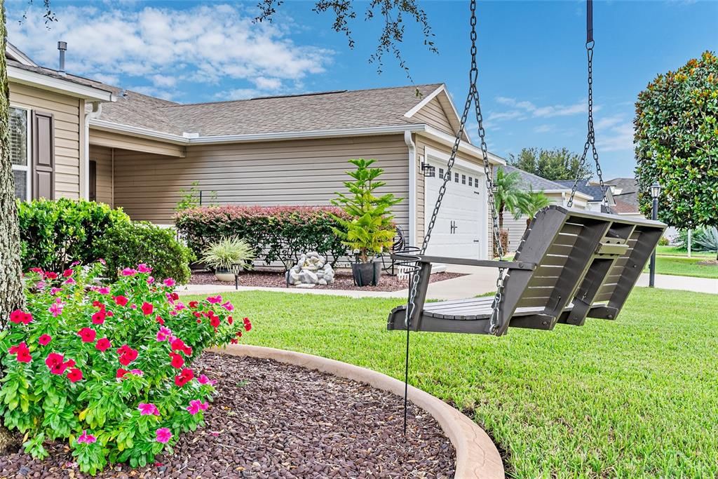 Another view of the WOODEN SWING in front yard