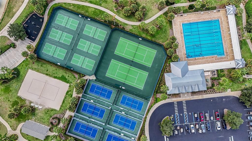 OVERHEAD of Seabreeze Rec Center - Showcasing the full length sports pool, tennis and pickleball courts, beach volleyball courts, outdoor exercise machines, amongst so many other opportunities!