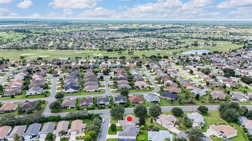 AERIAL - Looking Southwest - featuring Yankee Clipper (center) & Southern Star (deeper right) Executive GCs, as well as the CR 466A commercial corridor (deep center) just minutes from the home!